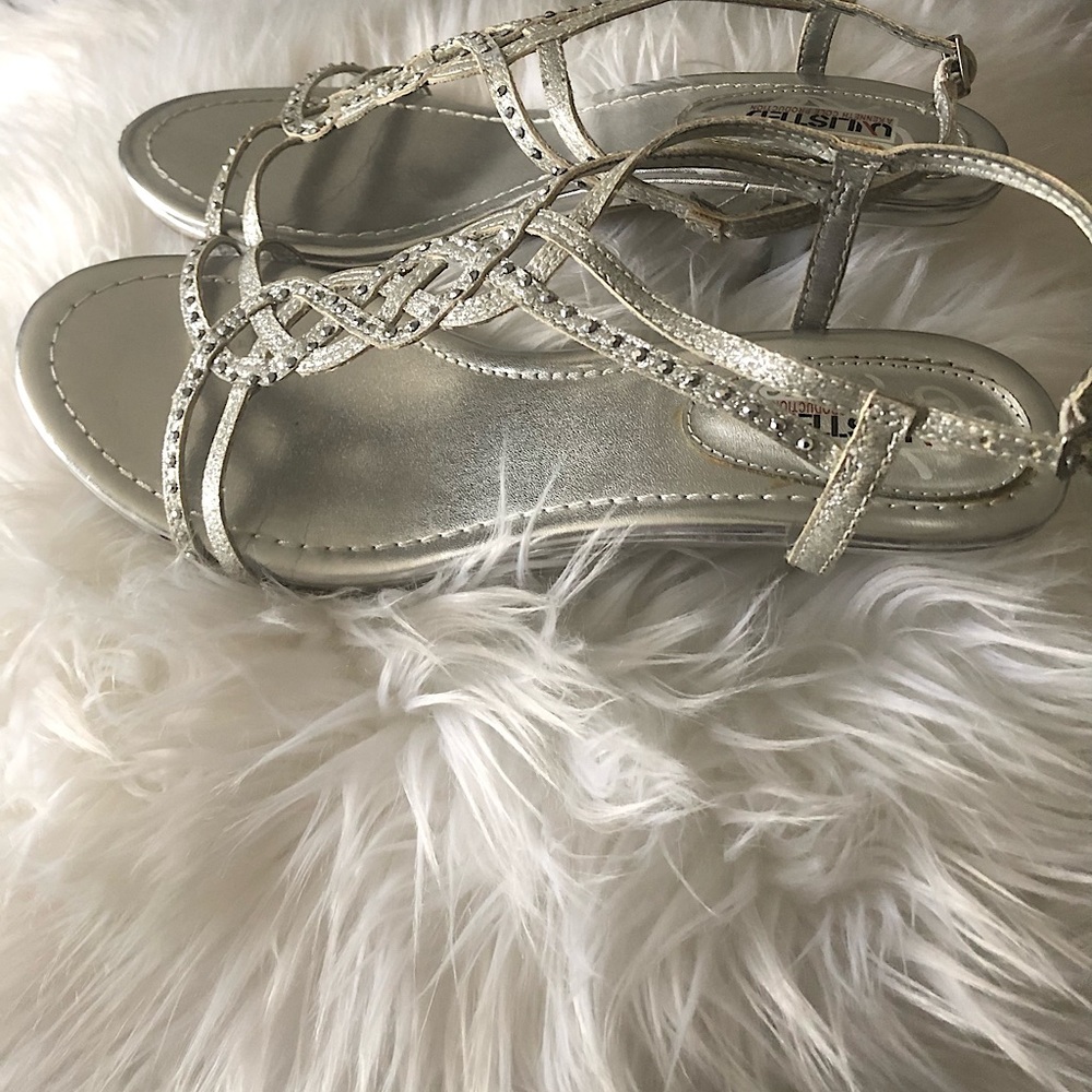 Silver Metallic Sandals with 1 1/2 inch heels.